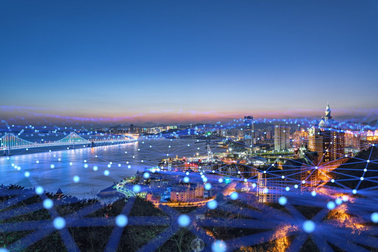 City skyline with blue grid lines