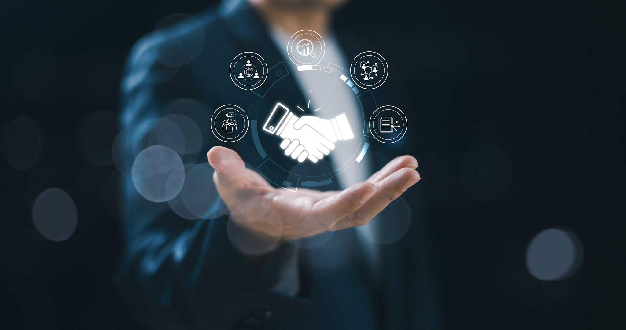 Business professional holding a digital handshake icon, symbolizing trusted partnerships, professional services, and collaborative value delivery