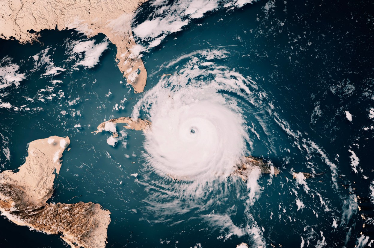 Satellite view of a major hurricane over the Caribbean representing disaster recovery, resilient infrastructure, and sovereign cloud protection in The Bahamas
