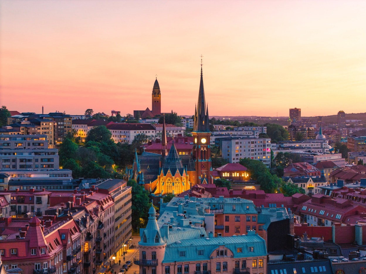 European city skyline at sunset symbolizing Broadcom EMEA partners driving VMware Cloud Foundation adoption and customer success across Europe, the Middle East, and Africa.