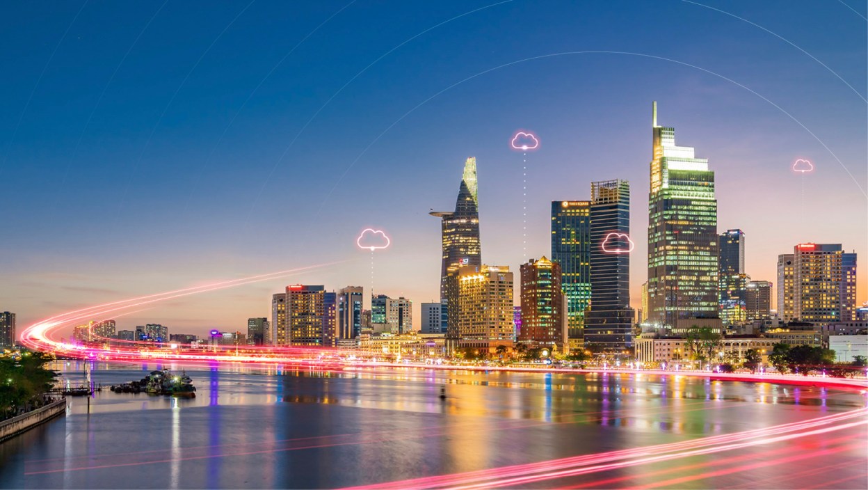 Modern Ho Chi Minh City skyline with cloud connectivity graphics, representing Viettel IDC and Broadcom's partnership to deliver sovereign, AI-ready private cloud infrastructure across Southeast Asia.