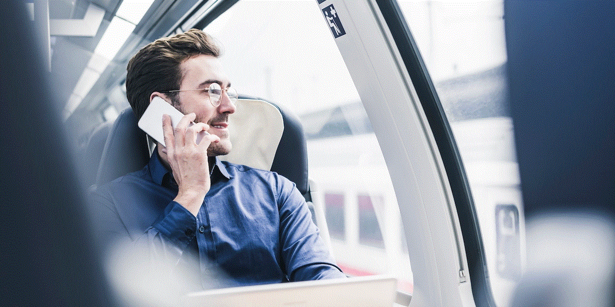 man making a call in a train