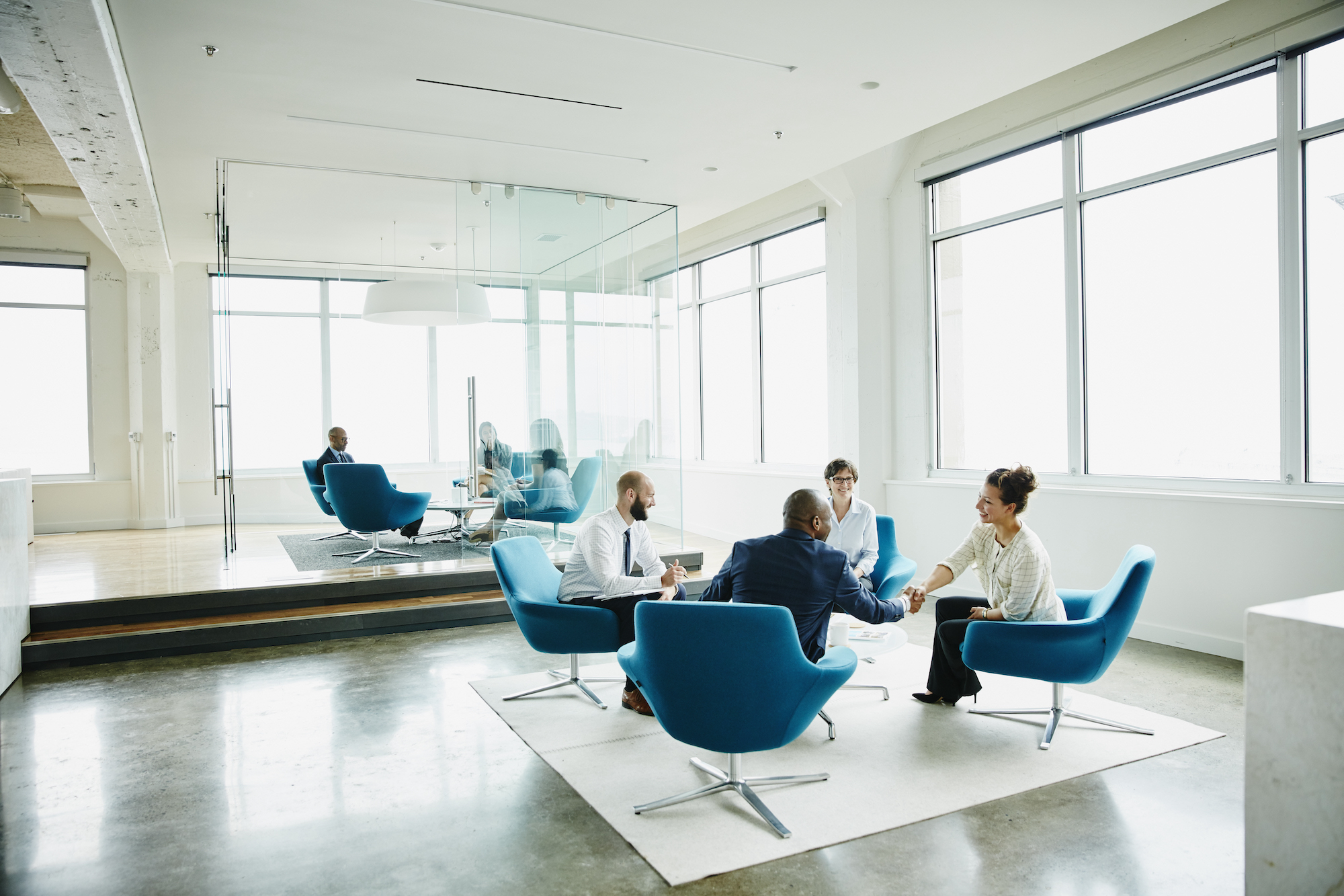 Businesspersons sitting in meeting