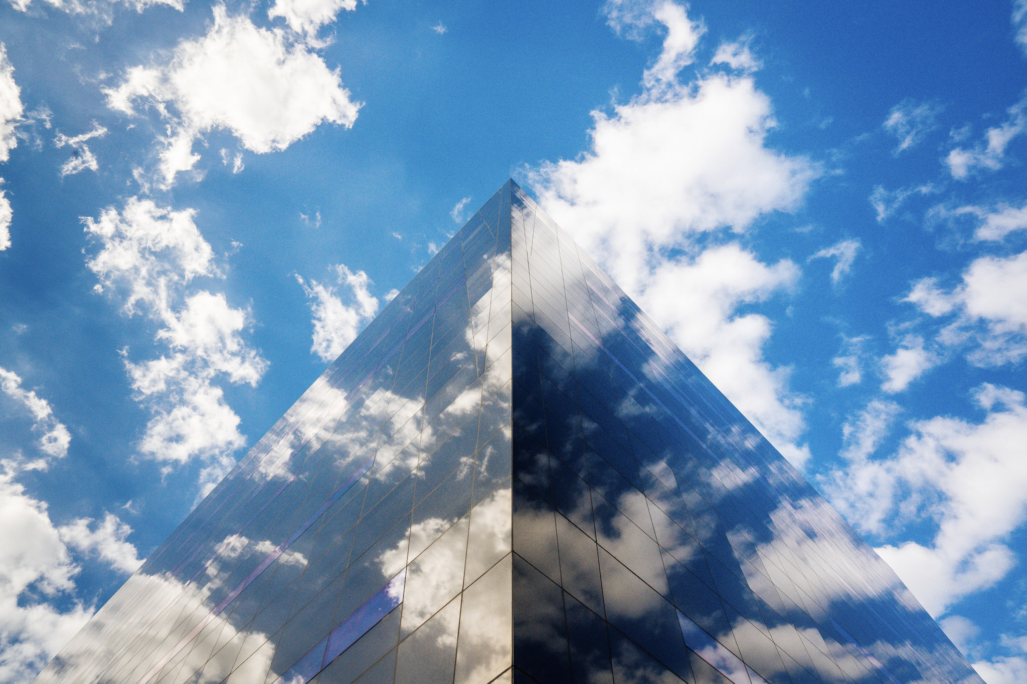 Building windows reflecting clouds