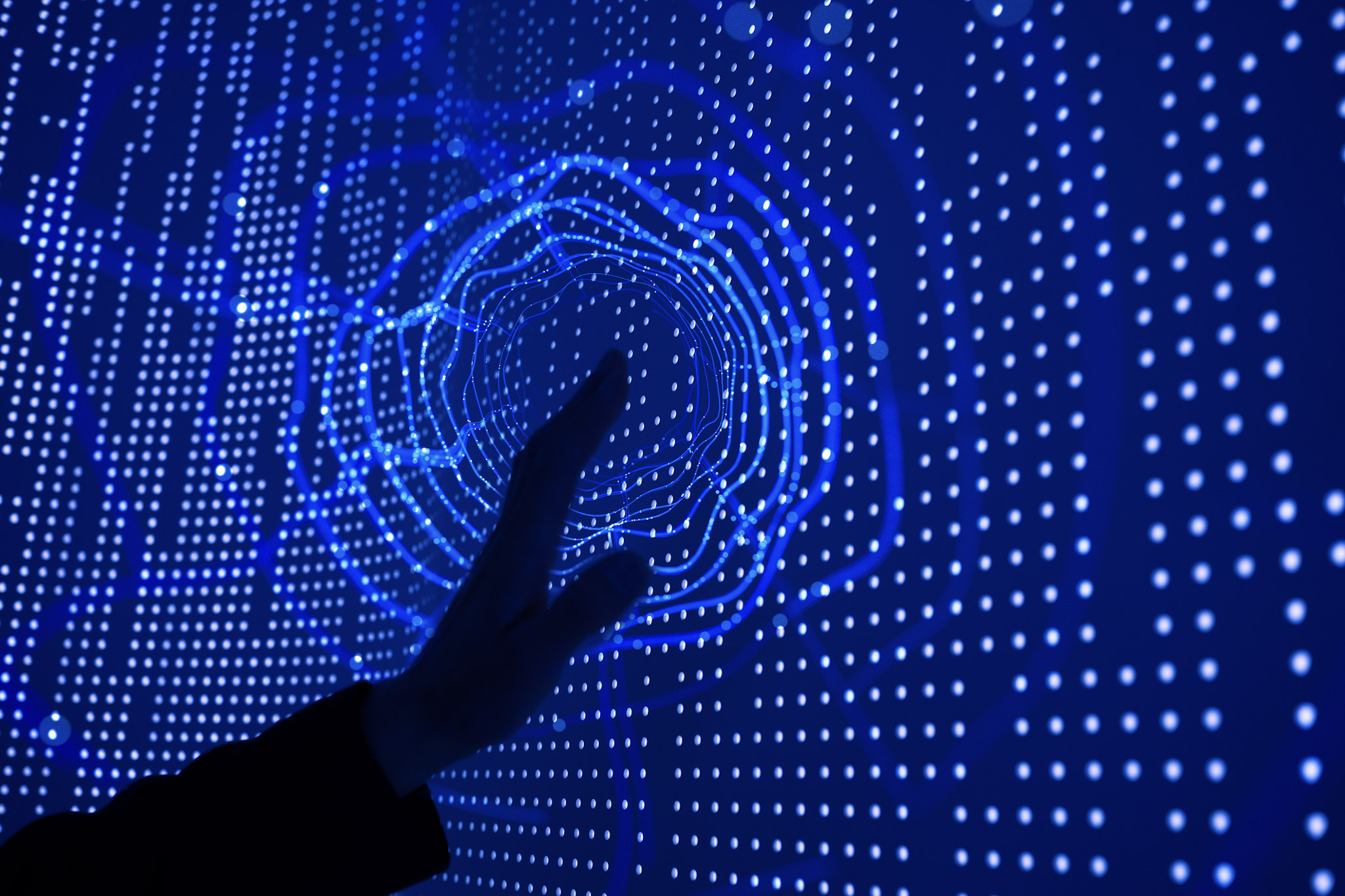 A hand touching a spacial tunnel